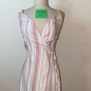 Pink shirt dress. Ties in the front.